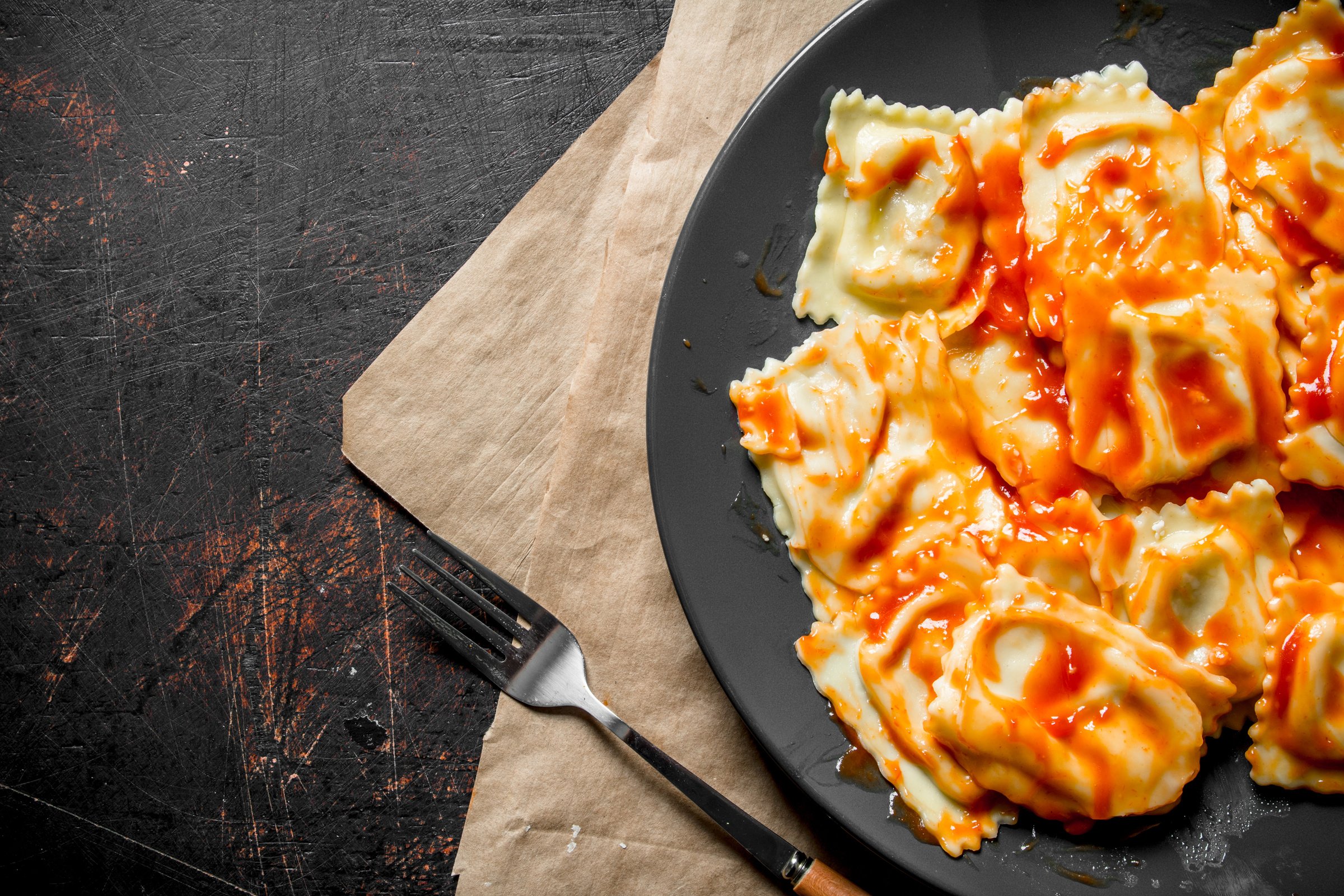 Italian ravioli with sauce.